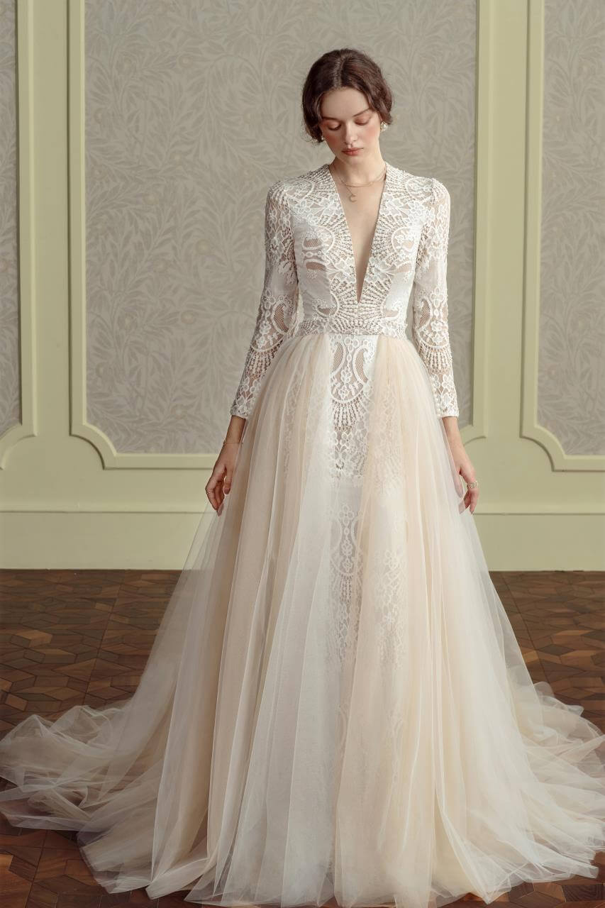 long sleeve lace wedding dress nz Vintage inspired in cotton guipure. Textured yet refined, this ivory guipure lace wedding dress is cut in a fitted sheath silhouette, finished with a flowing train. The sheer lace neckline and long,